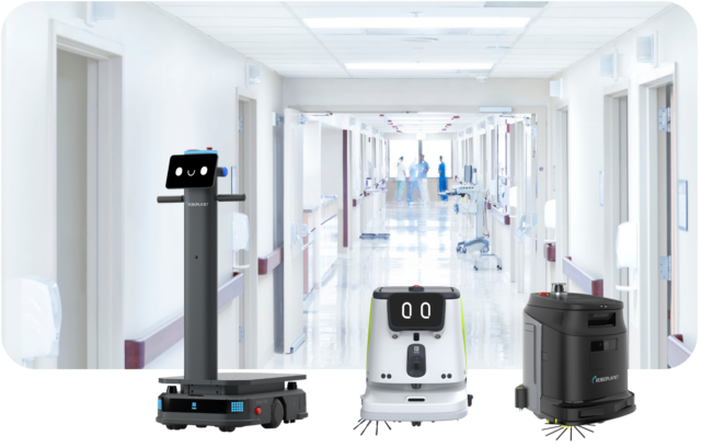 Liefer- und Reinigungsroboter von RoboPlanet in einem Klinikflur. Visualisiert Robotik im Gesundhietswesen.